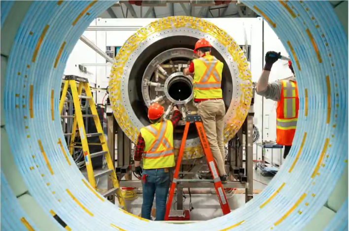 The General Fusion team assembling LM26